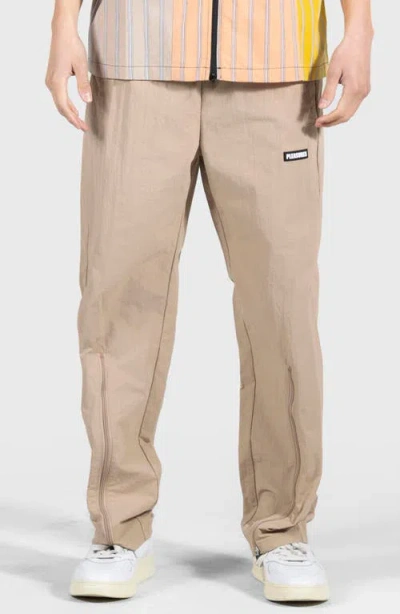 Pleasures Gaze Zip Hem Track Pants In Tan