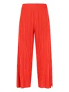 Pleats Please Wide-leg Cropped Trousers With Distinctive Pleated Texture In Red