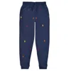 Polo Ralph Lauren Trousers With Allover Logos In Blu