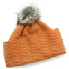 Portolano Faux Pom Beanie In Brown