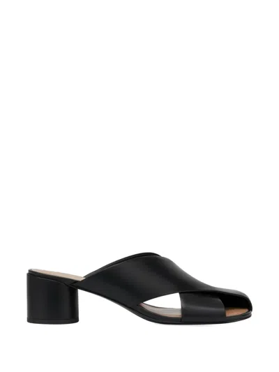 Potamy Cross-front Logo Mules In Black