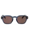 Prada Sunglasses With Iconic Metal Plaque In 17t05d Transparent Ocean