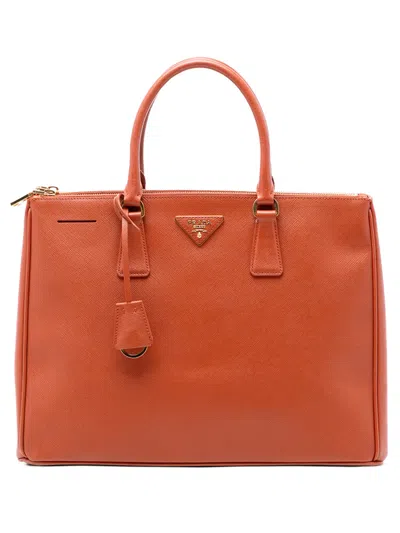 Pre-owned Prada 2013-2026 Large Saffiano Lux Galleria Double Zip Satchel In Orange