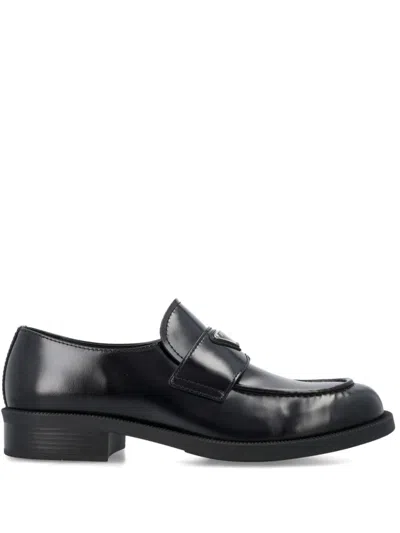 Prada Triangle Logo Brushed Leather Loafers In Black