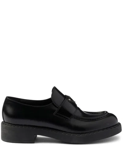 Prada Triangle Logo Brushed Leather Loafers In Black