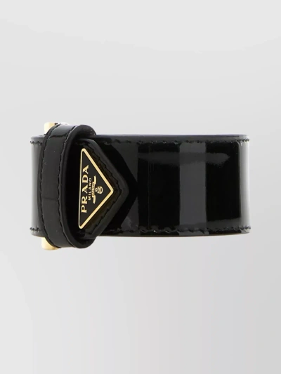PRADA ADJUSTABLE LEATHER BRACELET WITH PATENT FINISH AND GOLD-TONE BUCKLE