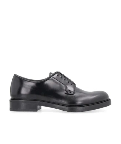 Prada Almond Toe Derby Shoes In Black
