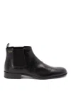 Prada Pull-tab Ankle Boot In Black