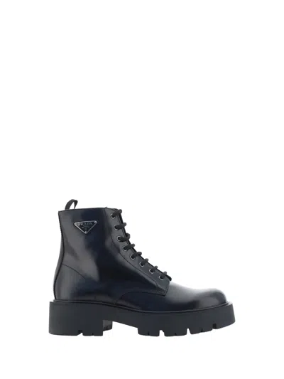 Prada Logo-plaque Panelled Ankle Boots In Black