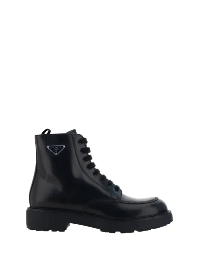 Prada Logo-plaque Panelled Ankle Boots In Black