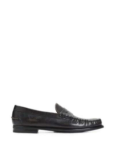 Prada Antiqued Leather Loafers In Animal Print