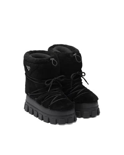 PRADA APRÈS-SKI-STIEFELETTEN AUS LAMMFELL