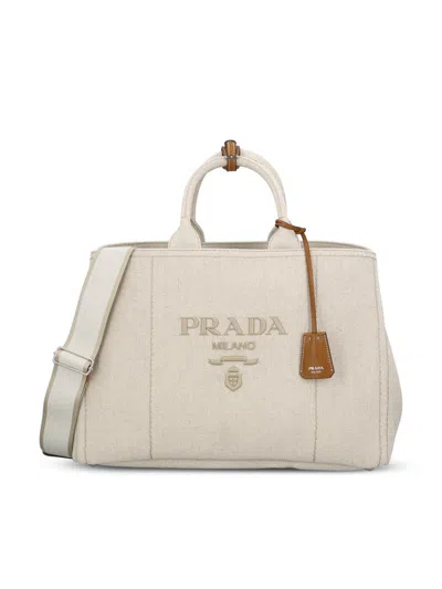 Prada Bags In Sand