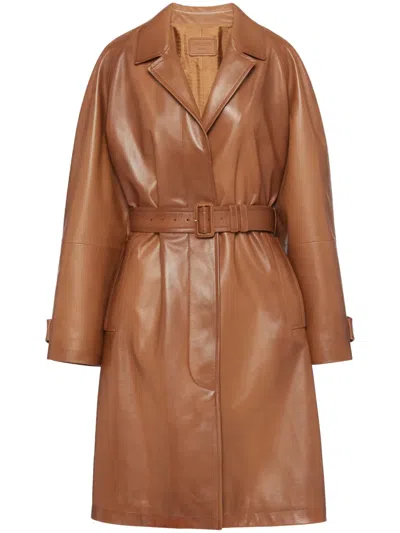 Prada Belted Leather Trench Coat In Caramel