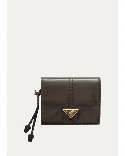 Prada Bifold Soft Leather Wallet In Brown