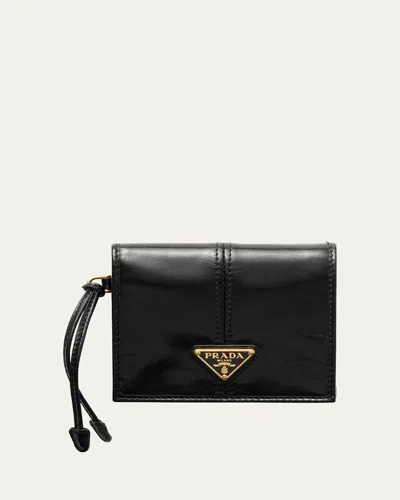 Prada Bifold Soft Leather Wallet In Nero