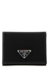 Prada Black Wallet With Classic Fold-over Design And Logo Plaque In Pink