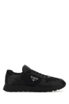 Prada Leather And Fabric Low-top Sneakers In Black