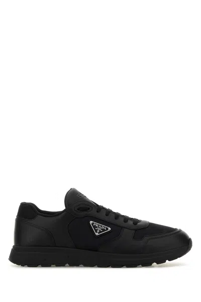 PRADA BLACK LEATHER AND FABRIC SNEAKERS