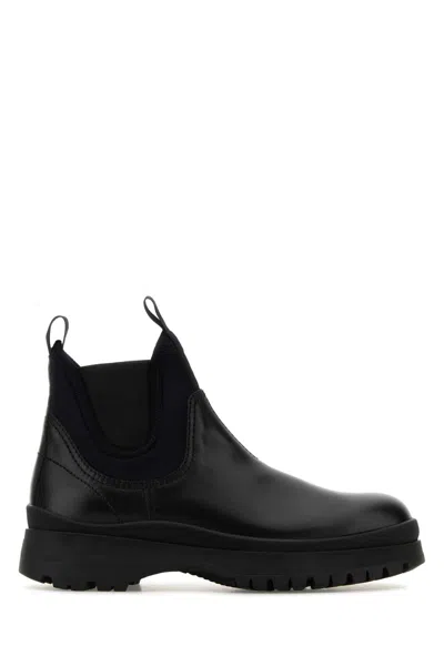 Prada Chunky Sole Leather Ankle Boots In Black