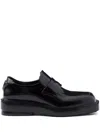 Prada Triangle Patch Leather Loafers In Black