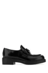 Prada Black Logo Plaque Loafers In Black