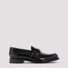 Prada Triangular Plaque Loafers In Black