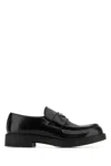 Prada Triangle Logo Brushed Leather Loafers In Black