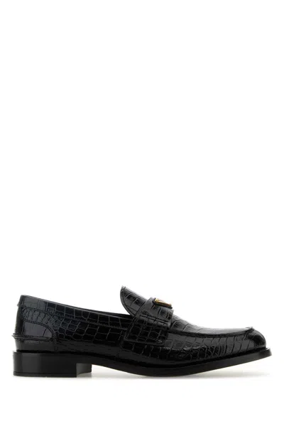 Prada Leather Loafers With Decorative Buckle And Round Toe In Black