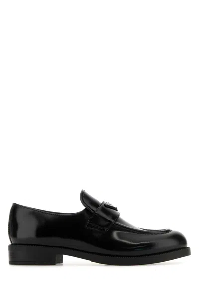 Prada Leather Loafers With Decorative Buckle And Round Toe In Black