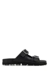 Prada Flat Sole Open Toe Leather Sandals In Black