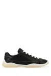Prada Handcrafted Leather Sneakers Geometric Stitching In Black