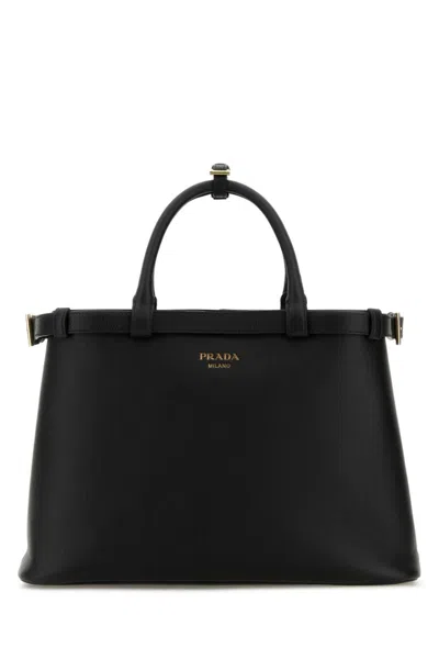PRADA WOMEN BLACK LOGO-PLAQUE LEATHER TOTE, ONESIZE LUXURY TOTES FOR WOMEN DARVEYS