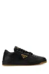 Prada Enamel-triangle Leather Sneakers In Black