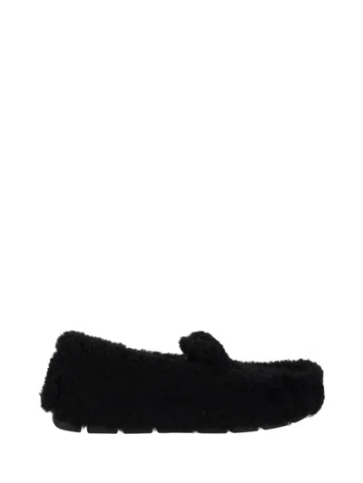 Prada Triangle Logo Shearling Loafers In Black
