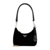 Prada Curved Black Shoulder Bag With Gold-tone Logo Plaque