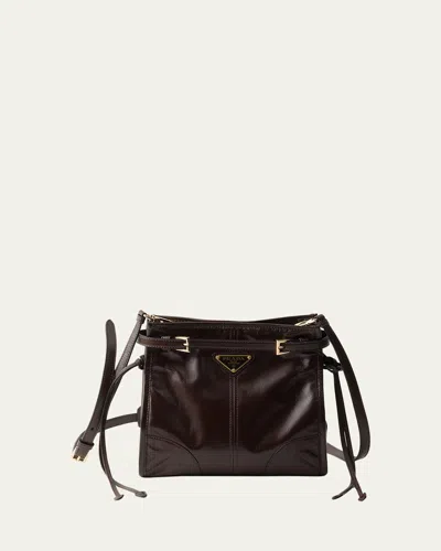 Prada Bonnie Belted Leather Crossbody Bag In Brown