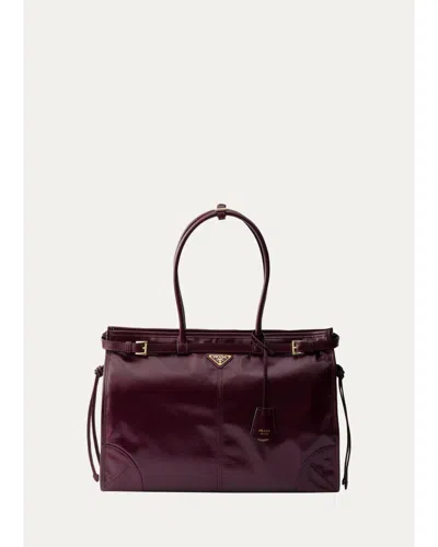 Prada Bonnie Glossy Leather Tote Bag In Burgundy