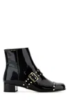 Prada Patent Leather Ankle Boots In Black