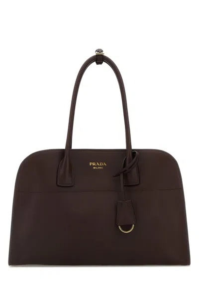 PRADA BORSA SHOPPING MEDIA IN PELLE MELANZANA  DONNA