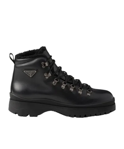 Prada Logo Plaque-detailing Boots In Black