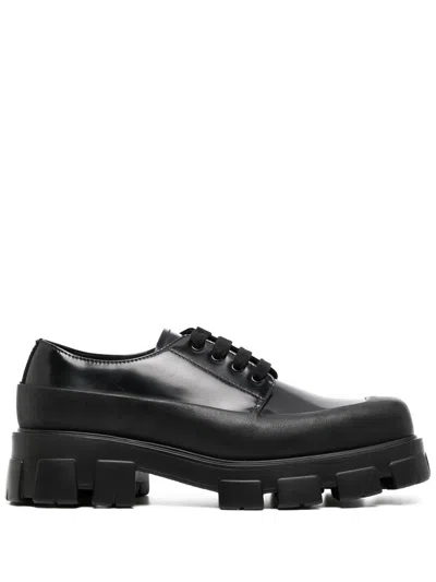 Prada Paneled Leather Derby Shoes In Black