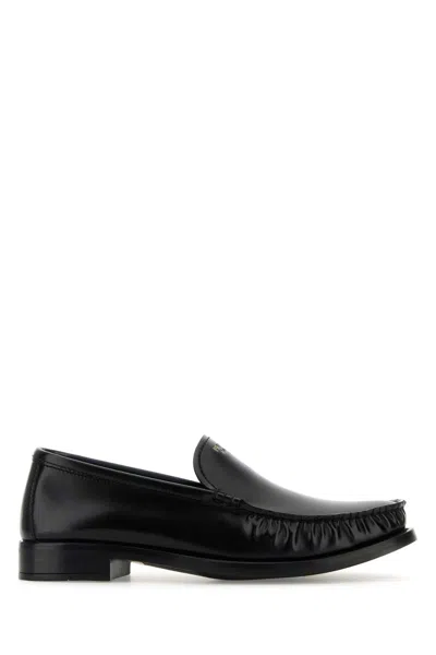 Prada Brushed Fumé Leather Loafers In Black