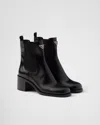 Prada Elasticated Leather Ankle Chelsea Boots In Black
