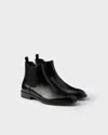 Prada Chelsea Boots Aus Gebürstetem Leder In Gray