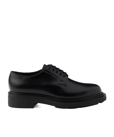 Prada Brushed Leather Derby Shoes In Black