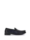Prada Polished Leather Flat Shoes In Black