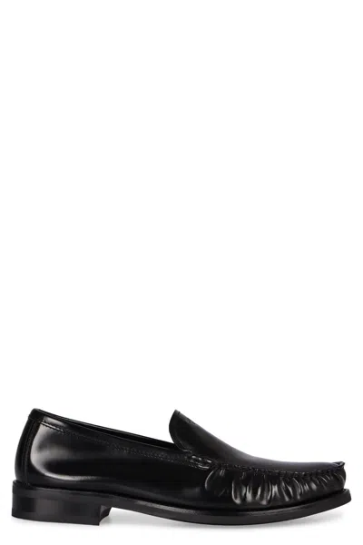Prada Brushed Leather Loafers In Black