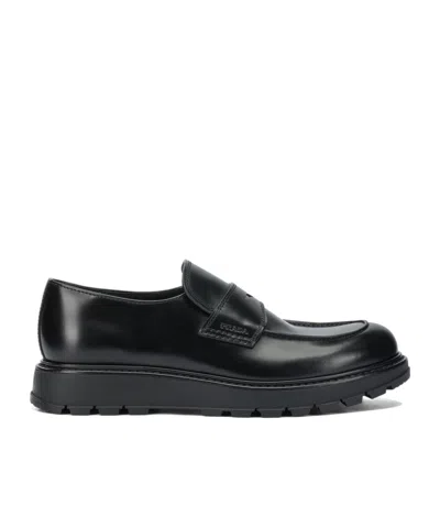 Prada Brushed Leather Loafers In Black