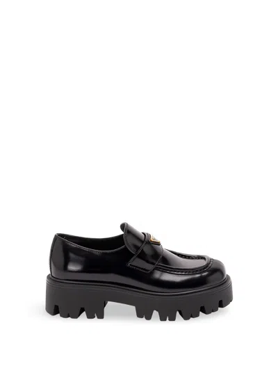 Prada Brushed Leather Loafers In Black